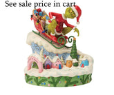 Enesco Dr. Seuss Grinch by Jim Shore Grinch Sitting on a Small Sled 6018956