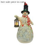 Enesco Jim Shore Heartwood Creek Snowman Holding a Candle Lantern lit up 6019280
