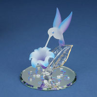 Hummingbird with Blue Flower